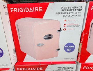a pink frigidaire mini beverage fridge