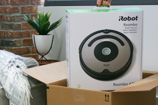 robot roomba coming out of box