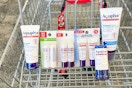 a variety of aquaphor products in a cart