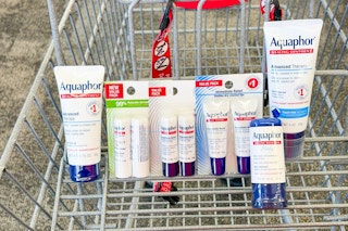 a variety of aquaphor products in a cart