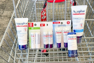 a variety of aquaphor products in a cart