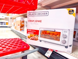 Target in store photo of the Black + Decker Crisp Bake Air Fryer Oven next to Target shopping cart