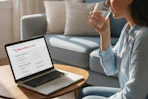a woman looking at clearvoice surveys on her laptop