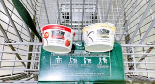 yogurts in a cart at whole foods