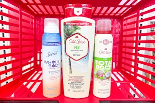 old spice and secret products in a red shopping basket