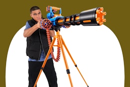 Stock image of teen using the XShot Insanity Motorized Blaster toy