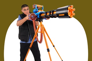 Stock image of teen using the XShot Insanity Motorized Blaster toy