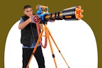 Stock image of teen using the XShot Insanity Motorized Blaster toy
