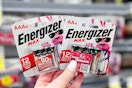 hand holding energizer max batteries