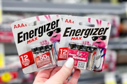 hand holding energizer max batteries