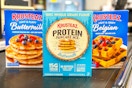 krusteaz pancake and waffle mixes on register belt