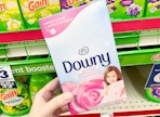 Downy dryer sheets being held in aisle