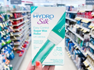 hand holding hydro silk wax roller