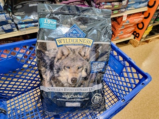 bag of dog food in a cart
