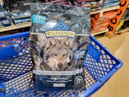 bag of dog food in a cart