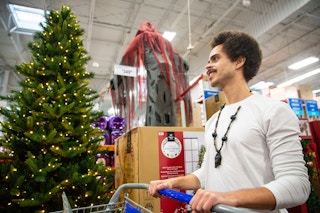 man shopping in sam's club on Black Friday
