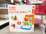 brightstarts baby walker sitting in front of a target shelf