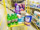 groceries in a yellow shopping cart