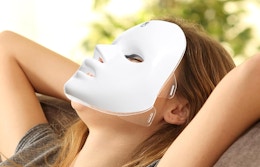 a person wearing a LED face mask 