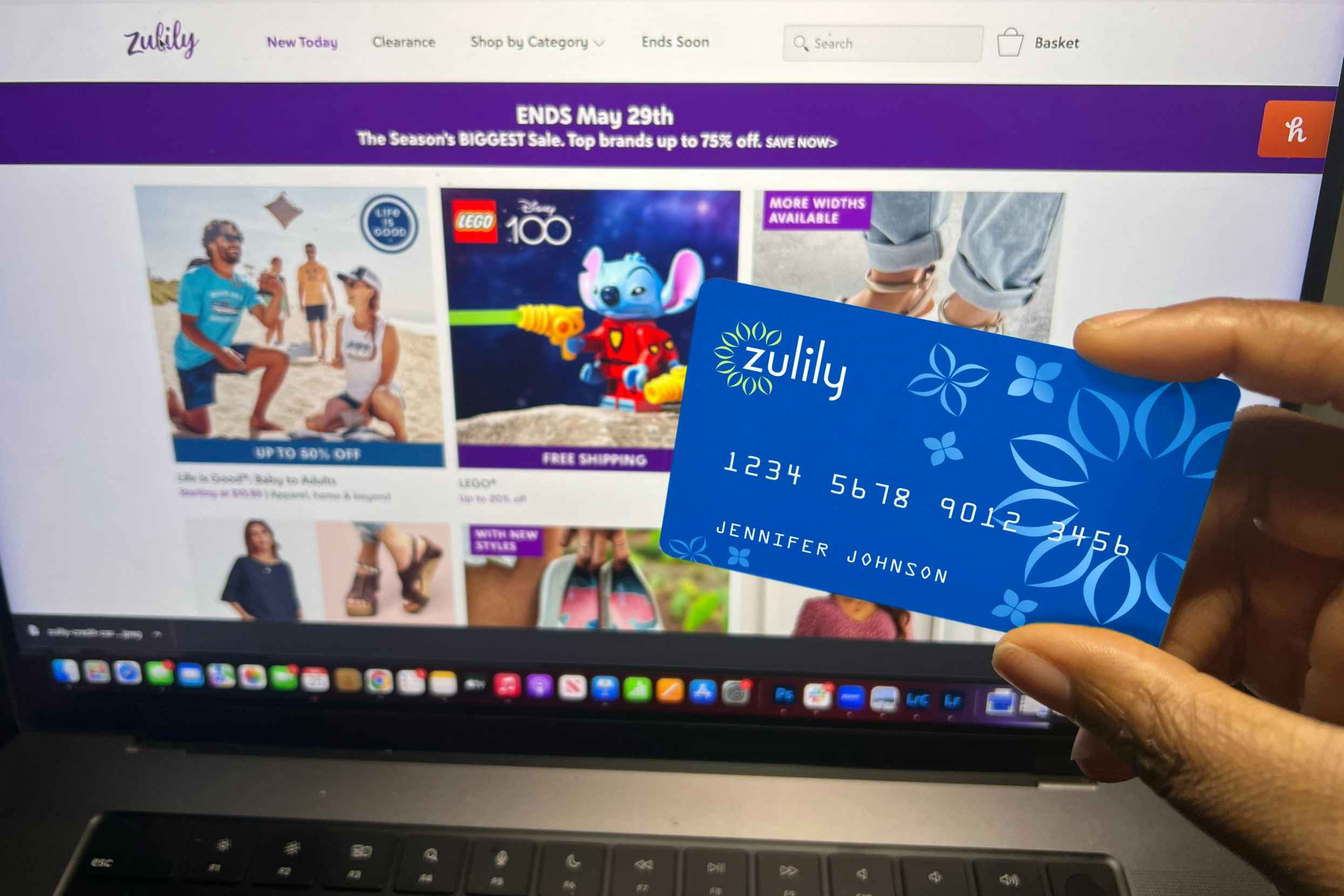 hand holding zulily credit card