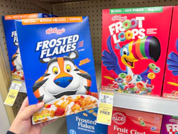 hand holding kellogg's cereal in walgreens