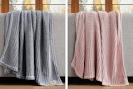 2 lifestyle images of Ugg throw blankets in 2 colors