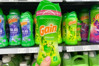 Gain Scent Boosters held up in laundry aisle of Walmart