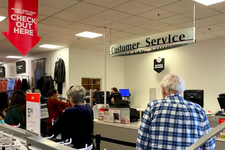 People standing in customer service line at jcpenney