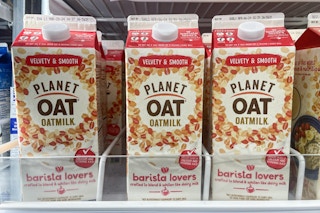 hand holding planet oat oatmilk at meijer