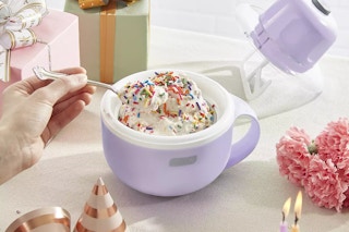 ice cream sundae in the Dash My Mug Ice Cream Maker on a table surrounded by birthday presents