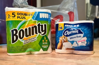 charmin and bounty paper towels in front of a Walgreens bag