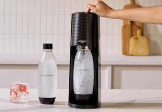 a SodaStream machine making sparkling water