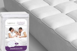SafeRest CloudGuard - Queen Size Hybrid Mattress Protector next to a bed.