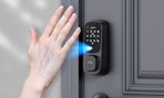 a person showing their palm to a door lock