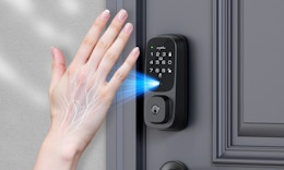 a person showing their palm to a door lock