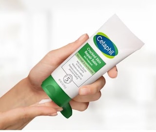hand holding cetaphil balm