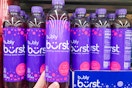 hand holding a bottle of bubly burst sparkling water
