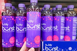 hand holding a bottle of bubly burst sparkling water