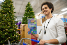 a person in Sam's Club with the black friday ad