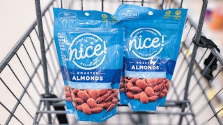 two bags of nice almonds in shopping cart