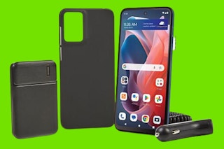 Tracfone Moto G Play set on a light green background. 
