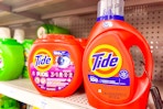 tide pods and liquid detergent on a shelf