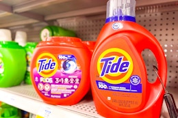 tide pods and liquid detergent on a shelf