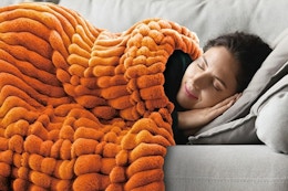 This Sherpa Throw Blanket Is Just $9.79 on Amazon card image