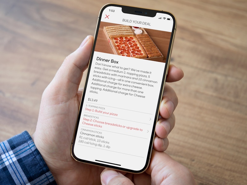 A person ordering a Pizza Hut Dinner Box on the app