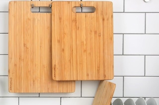 three cutting boards in a kitchen