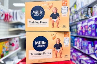 2 packages of Millie Moon training pants stacked on top of Target shopping cart