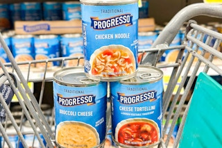 progresso soup cans stacked in shopping cart