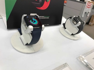 two apple watch models on display at Target