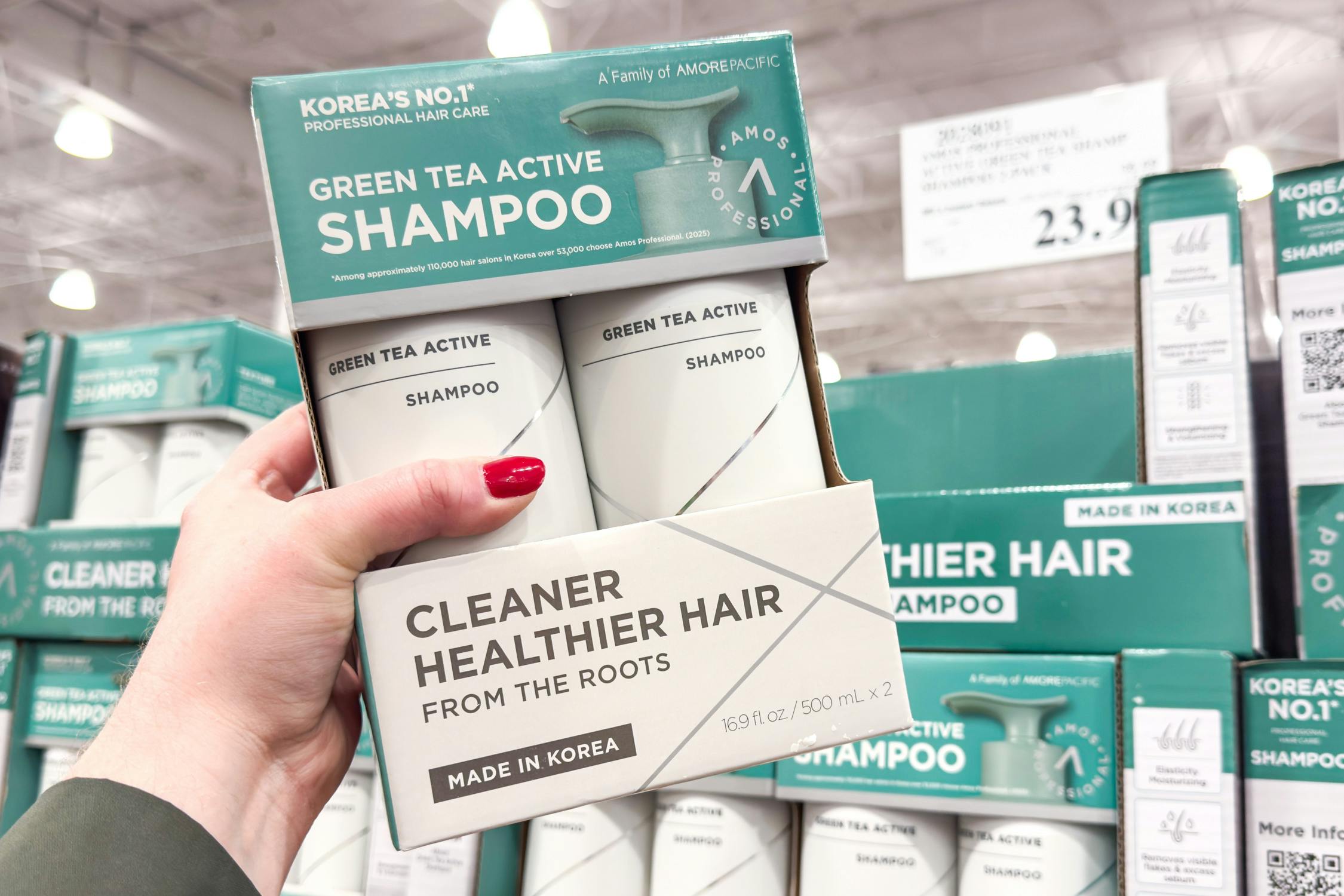 hand holding amos professional hair care set
